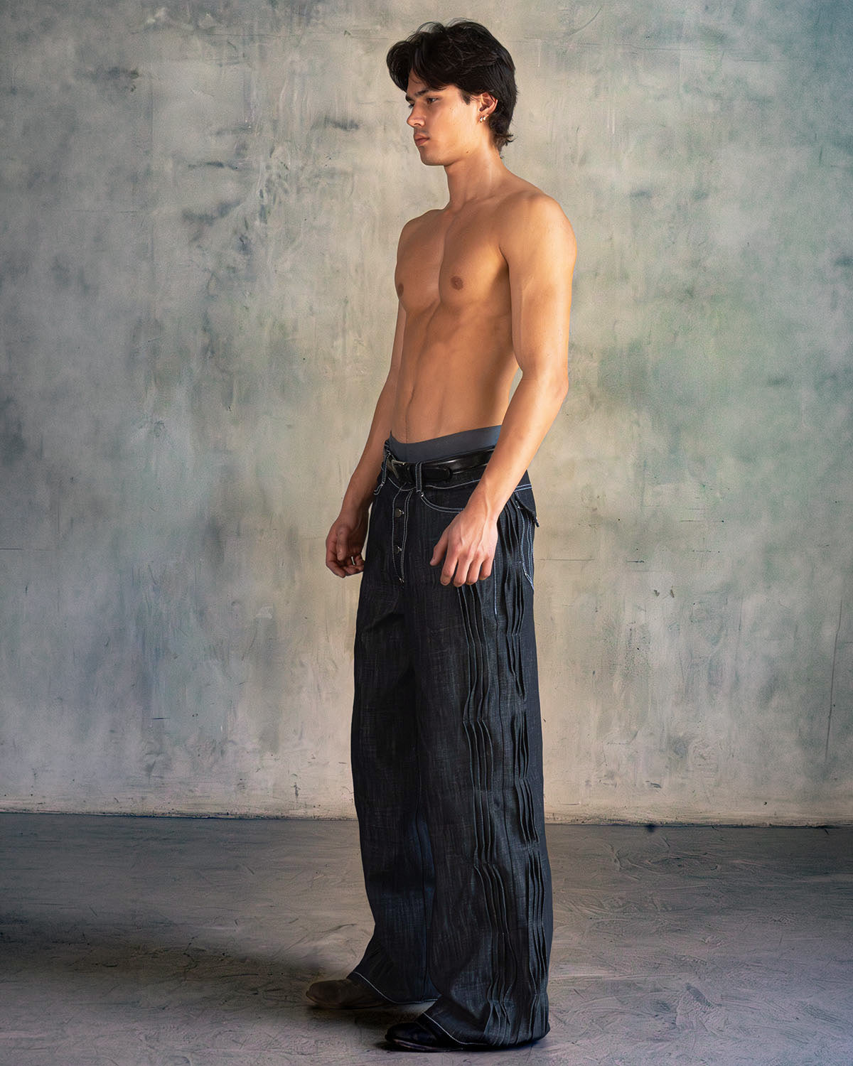 'distorted' wavy pleated raw denim pants