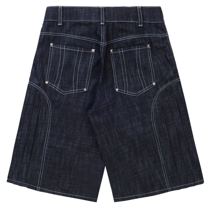 'Uniform' pleated raw denim jorts